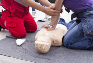 An employee is instructed on how to properly perform CPR