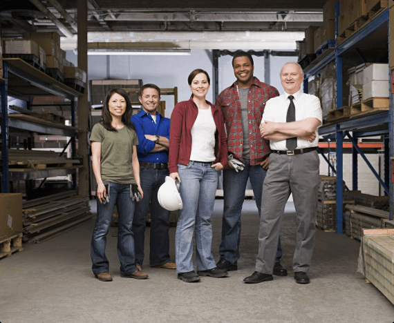 Workers in a safe workplace pose for a photo together